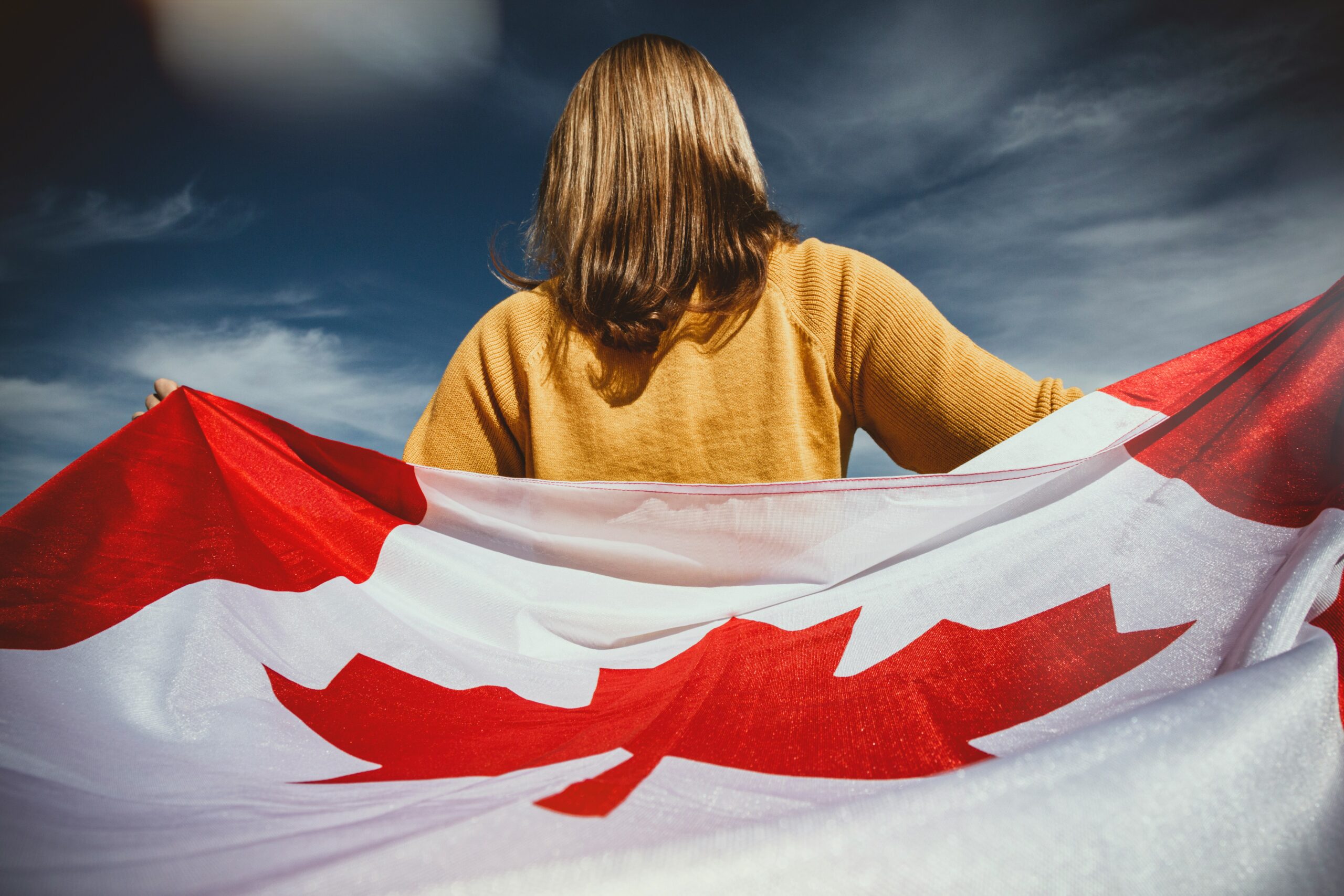 image of a young female with a canadian flag